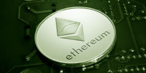 ethereum coin on top of a circuit board